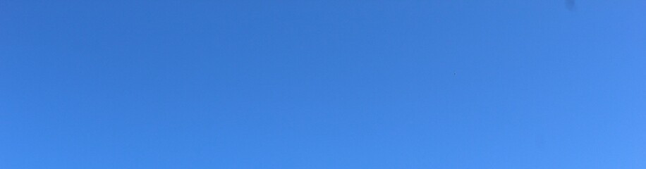Bright spring sky. Spring day the sky is light blue without clouds. A rare completely cloudless day.