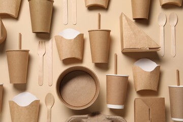 Flat lay composition with eco friendly food packagings on beige background