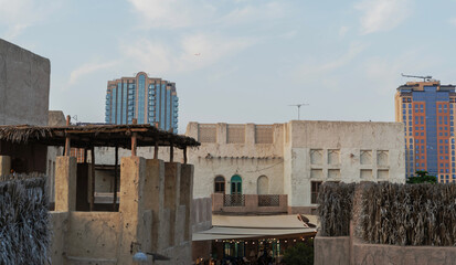 Fototapeta premium Arabic Architecture - a city scape rooftop skyline in Al Seef Khor Dubai