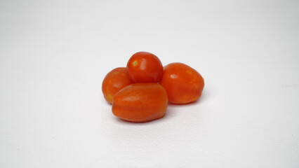 Red cherry tomatoes isolated on white background
