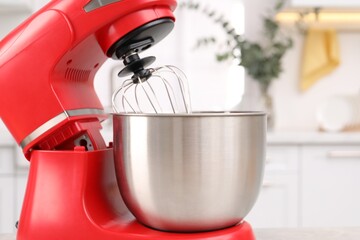 Modern red stand mixer in kitchen, closeup