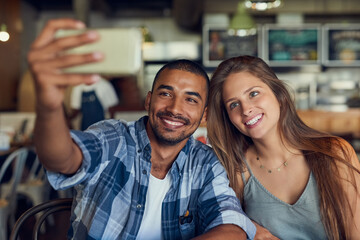 Smartphone, selfie and happy couple at cafe for brunch date, romance or anniversary celebration....