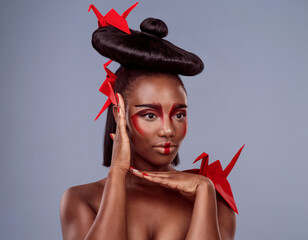 Fashion, frame and origami with black woman in studio isolated on gray background for style....
