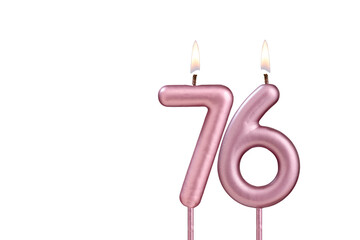 Candle number 76 - Lit birthday candle on white background