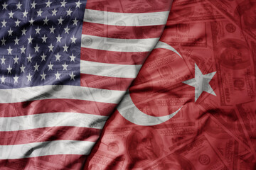 big waving colorful flag of united states of america and national flag of turkey on the dollar money background. finance concept.