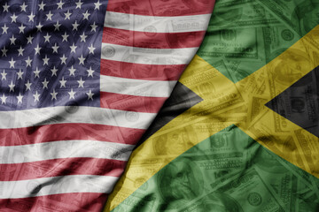 big waving colorful flag of united states of america and national flag of jamaica on the dollar...