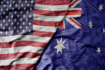 big waving colorful flag of united states of america and national flag of australia on the dollar...