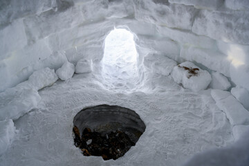 An inside view of the fire pit in the igloo, the traditional shelter of the northern peoples from...