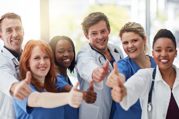 Happy people, portrait and medical team with thumbs up for success, good job or well done at...