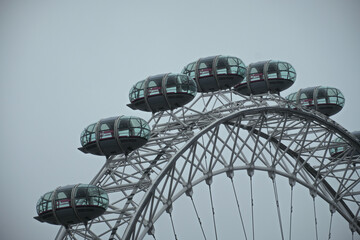 London, United Kingdom - March 20, 2023. Capsules or cabins of ferris wheel. Metal structure of a ferris wheel called The London Eye in London, England, United Kingdom - obrazy, fototapety, plakaty