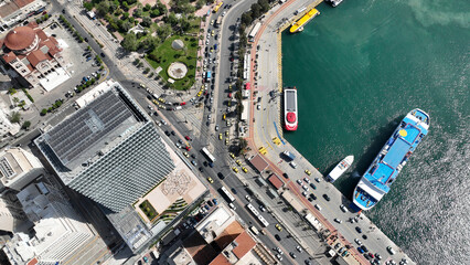 Aerial drone photo from famous busy port of Piraeus and new renovated landmark skyscraper Tower of...