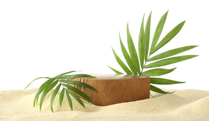 Presentation of product. Wooden podium and palm leaves on sand against white background