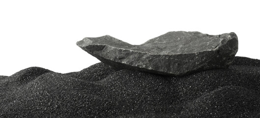 Presentation of product. Stone podium on black sand against white background