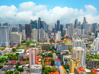 Aerial view of an urban area with tall residential and business skyscrapers in the central area
