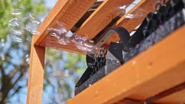 Automatic Soap Bubble Blowing Machines Used on Open Air Outdoor Festival Community Picnic Party