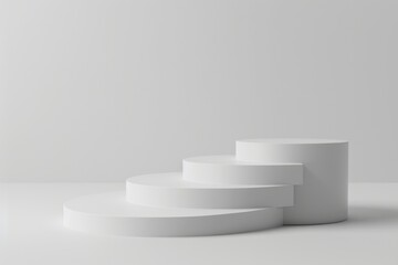 Three white pedestals on a clean white surface, perfect for product displays