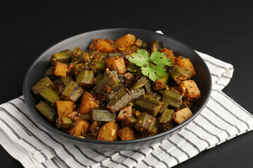 Aloo Bhindi, Potato Bhindi masala or Potato okra or lady finger fry served with Roti or Chapati or Rice ,indian food