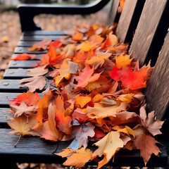 Vibrant autumn leaves scattered on a park bench. 