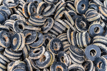 Old rubber washers used in the fishing industry in Mevagissey Cornwall