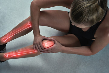 Studio, woman and legs with knee pain or injury with inflammation from exercise and workout. Female...