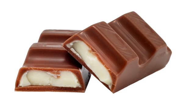 Pieces of chocolate with soft milk filling on a white background. Chocolate bar. Pastry