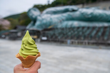 Green tea ice cream with blur reclining Buddha statue, Nanzoin