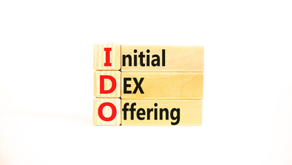 IDO initial DEX offering symbol. Concept words IDO initial DEX offering on beautiful wooden blocks....