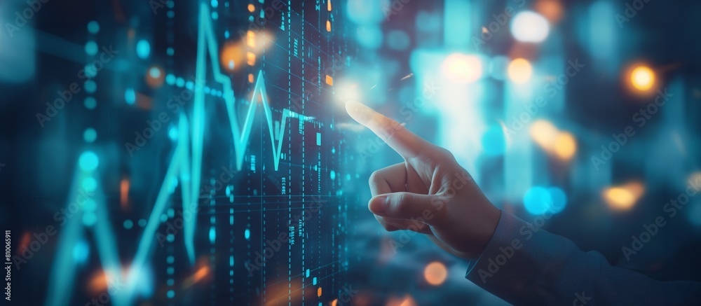 Poster banner, a hand is pointing at a graph on a computer screen. the graph is a series of lines and curve