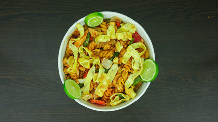 Shahi Chicken Pasta is made with chicken meat, egg, pasta, tomato, carrot, onion, lemon, garlic, green chili, cabbage and other ingredients. It is very tasty to eat and Spicy Flair