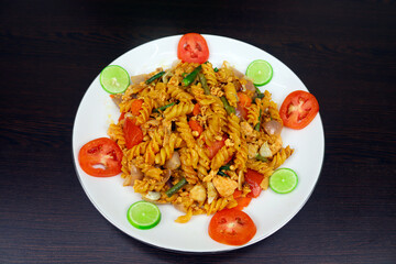 Shahi Chicken Pasta is made with chicken meat, egg, pasta, tomato, carrot, onion, lemon, garlic, green chili, cabbage and other ingredients. It is very tasty to eat and Spicy Flair