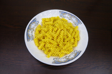 Shahi Chicken Pasta is made with chicken meat, egg, pasta, tomato, carrot, onion, lemon, garlic, green chili, cabbage and other ingredients. It is very tasty to eat and Spicy Flair