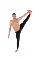 A young attractive man with an athletic body is doing fitness. White background.