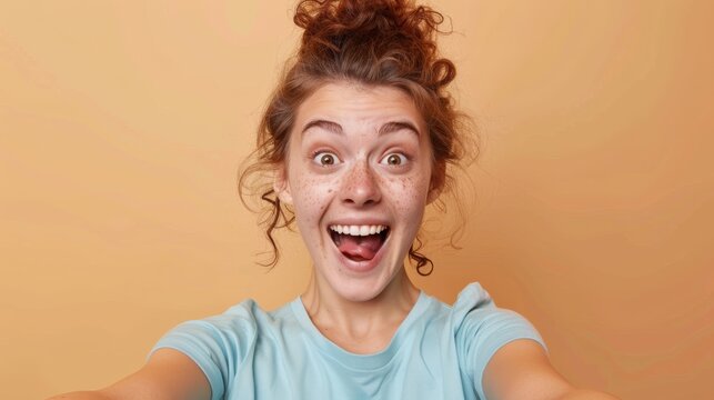 a woman takes a selfie on the phone