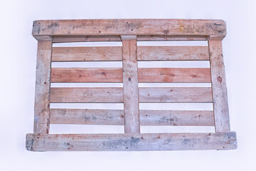 Wooden pallet isolate on a white background close-up.