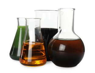 Laboratory glassware with different types of crude oil isolated on white