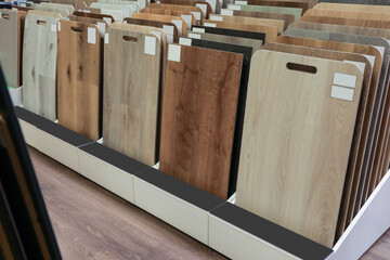 Many different samples of wooden flooring in store