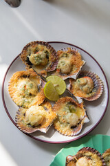 Conchitas a la parmesana grilled scallops with parmesan cheese grated peru peruvian food latin american
