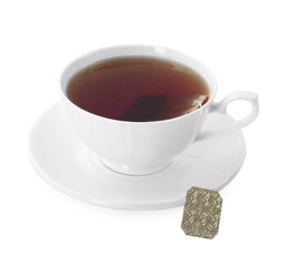 Tasty tea in cup isolated on white