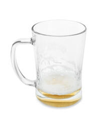 Almost empty mug of beer isolated on white