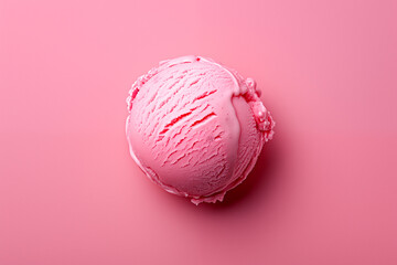 Top view of single scoop of bubble gum ice cream on pink background, minimalistic dessert concept