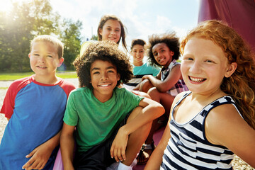 Children, park and portrait of group in summer to relax with friends on playground on vacation. Happy, holiday and kids together for party, games or smile outdoor at middle school on break at recess