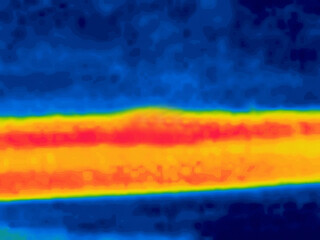 A trail in the park after the rain. Image from thermal imager device.