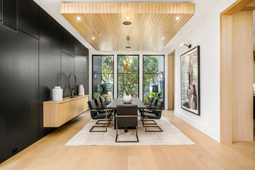 Spacious Dining Room With Large Table and Chairs
