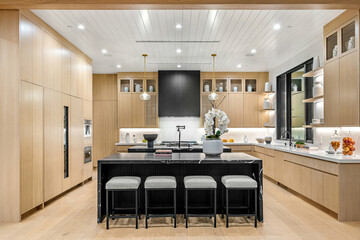 Modern Kitchen With Center Island and Stools