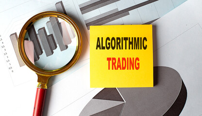ALGORITHMIC TRADING text on sticky on chart background
