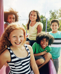 Kids, park and portrait of group in summer to relax with friends on playground on vacation. Happy, holiday and children together for party, games or smile outdoor at middle school recess or break