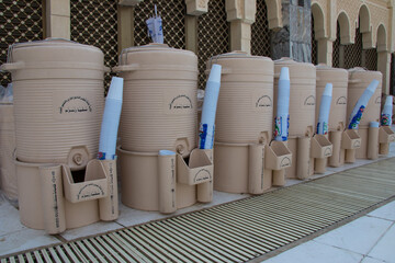 Mecca - Saudi Arabia: August 24, 218. Zamzam water in plastic drums in The Haram mosque in Mecca