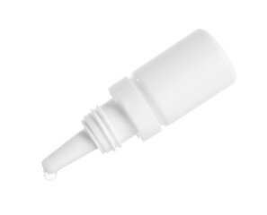 Dripping medical drops from bottle on white background