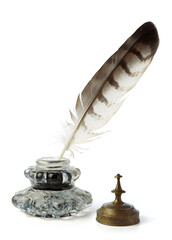 Feather with ink bottle. Calligraphy and beautiful vintage handwriting. 
