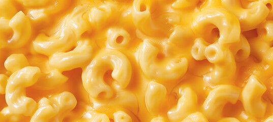 A close-up of creamy macaroni and cheese, tempting with its golden color and velvety texture, promising a delight for the palate.